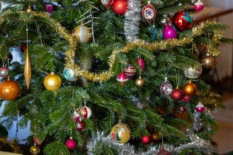 Christmas Bauble on Tree. Festive decorations on a Christmas tree. Stock Photos