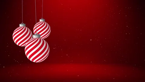 Christmas baubles swing on a string on red copy space loop background Stock Footage 339715868
