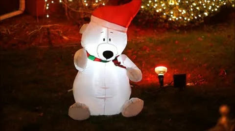  Christmas Bear display waves from front yard Stock Footage 12681020
