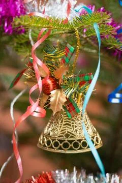 Christmas bell on a branch Stock Photos