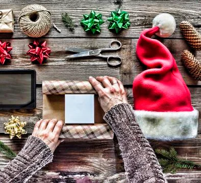 Christmas bell, Christmas decorations. Preparing a New Year's gift at home Photos