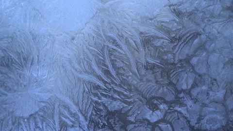 Christmas blue background with frozen pattern on window. Stock Footage 148561021
