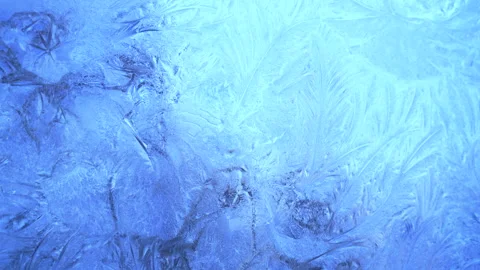 Christmas blue background with frozen pattern on window. Stock Footage 214399889