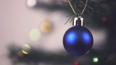 Christmas blue ball on an artificial white Christmas tree Stock Footage 145283928