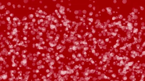 Christmas bokeh particles falling over elegant red background. Stock-Footage 258481468