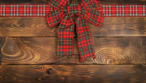 Christmas bow, background with copy space, golden Christmas decorations and Stock Photos