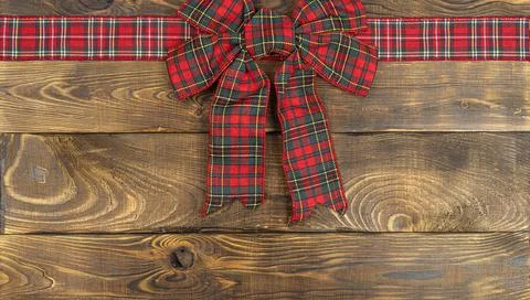 Christmas bow, background with copy space, golden Christmas decorations and Stock Photos