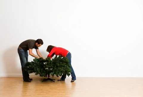 Christmas: building up tree base Stock Photos