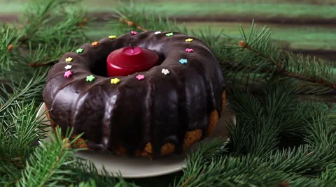 Christmas cake with candle Stock-Footage 58004494