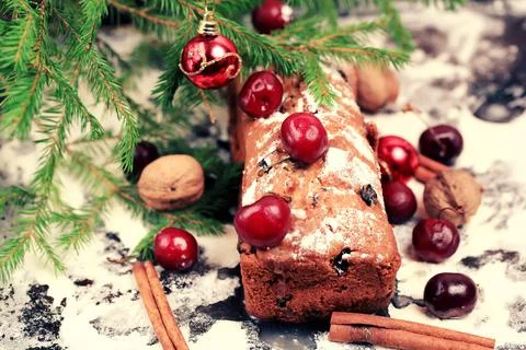 Christmas cake with cherry selective soft focus Stock Photos