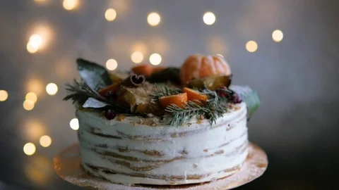Christmas cake on a stand on the background Stock Footage 98674980