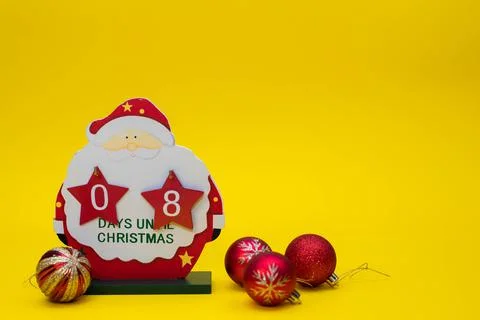 Christmas calendar counting down the days of a wooden Santa Claus Stock Photos