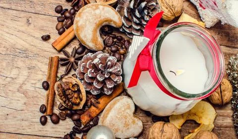Christmas candle and spice Stock Photos