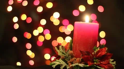 Christmas. Candle over lighting background Stock Footage 14118894