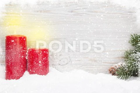 Christmas candles and fir tree Stock Photos