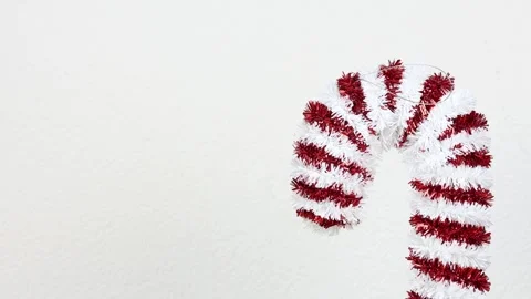Christmas candy cane decor on white background, establisher Video stock 285197864