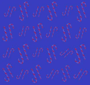 Christmas candy cane pattern on blue background. Flat lay and top view Foto stock