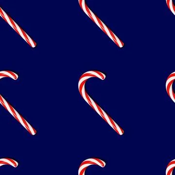 Christmas candy cane seamless pattern blue background. Christmastide lollipop Stock Photos