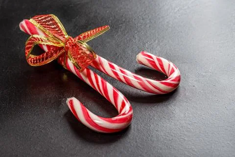 Christmas candy canes on a black background Stock Photos
