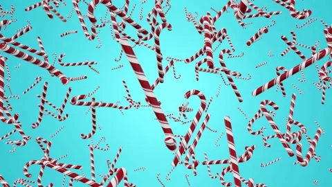 Christmas candy canes fly on blue background. New Year's holiday. Stock Footage 166134893