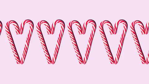 Christmas candy red and white heart-shaped staff move from left to right Stock Footage 141033602