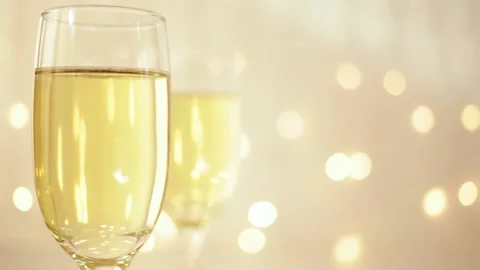 Christmas card, empty place for text, glasses of champagne on a wooden table Stock Footage 140491151