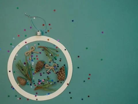 Christmas card with New Year objects in the shape of a Christmas ball on a green Stock Photos