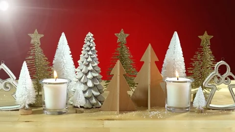 Christmas centerpiece or mantel decoration of rows of miniature Christmas Tre Stock Footage