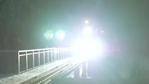 Christmas Children's Train with Blinking Lights riding on the Bridge Stock Footage 263588334