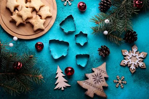 Christmas composition with biscuits on a green background Stock Photos