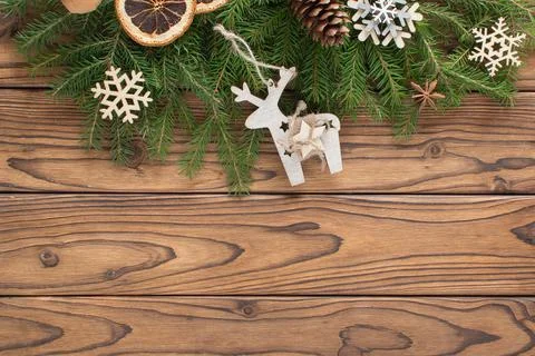 Christmas composition with branches of a Christmas tree and eco-natural decor Stock Photos