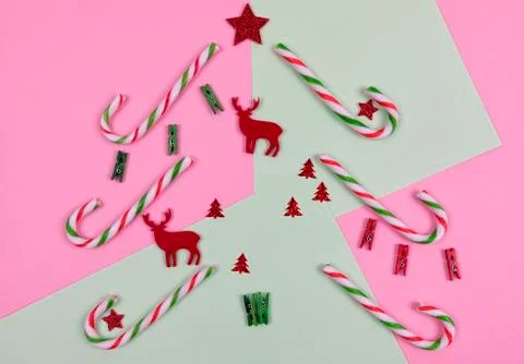 Christmas composition. Candy, red Christmas deers and decorations toys Stock Photos