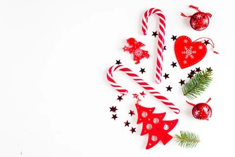 Christmas composition with christmas candy, tree branches and holiday ornamen Photos