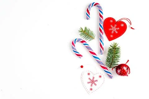 Christmas composition with christmas candy, tree branches and holiday ornamen Stock Photos