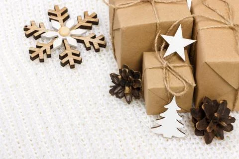 Christmas composition. Christmas gift, pine cones and star on white backgroun Stock Photos