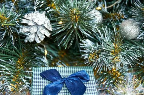 Christmas composition with Christmas tree branches in blue and silver balls.. Stock Photos