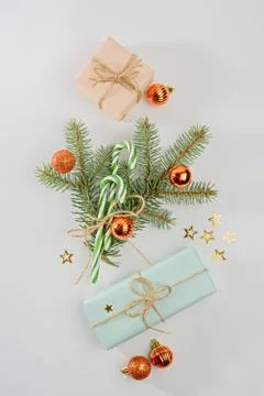 Christmas composition concept, gift boxes, spruce branches, Christmas balls t Stock Photos