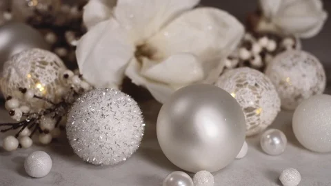 Christmas composition consisting of white baubles and flowers  4K resolution Stock Footage 97895179