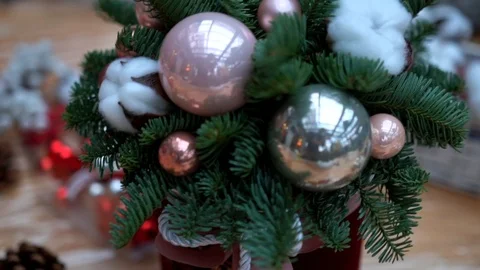 Christmas composition in dark gift box on light wooden surface table, close-up Stock-Footage 89240431