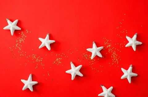 Christmas composition. decorations on a red background. new year concept. Stock Photos