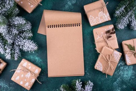 Christmas composition with empty craft notebook Stock Photos