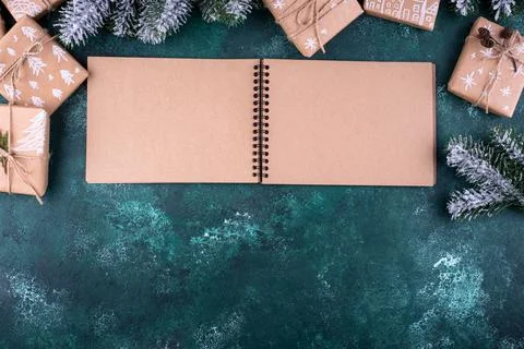 Christmas composition with empty craft notebook Stock Photos