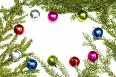 Christmas composition with empty frame of colorful balls and fir-tree branc.. Stock Photos