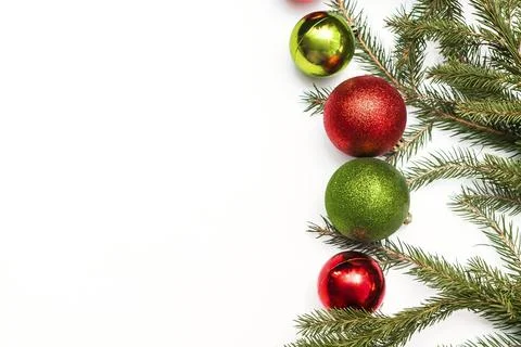 Christmas composition with empty frame of colorful red green balls and fir-.. Stock Photos