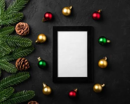 Christmas composition with empty picture frame. Colorful ornament Stock Photos