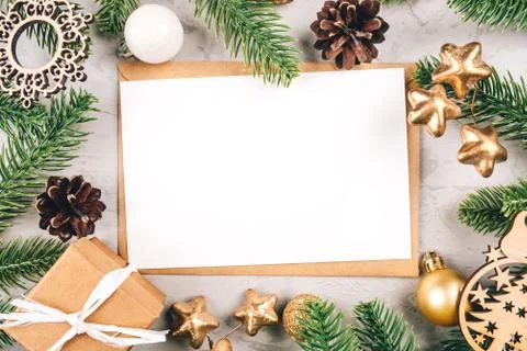 Christmas composition of fir tree branches and decorations. Stock Photos
