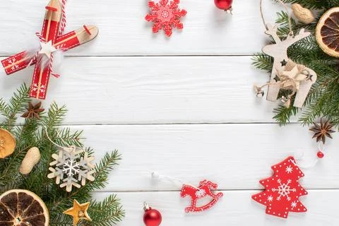 Christmas composition, frame with Christmas tree branches and red and white C Stock Photos