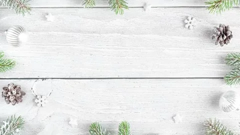 Christmas composition. Frame made of snowy fir branches, decorations, pine cones Stock Footage 294099870