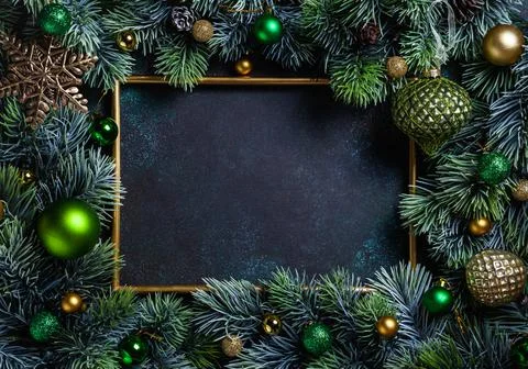 Christmas composition. Frame with pine branches and Christmas decorations on Stock Photos