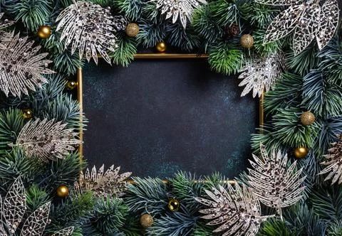 Christmas composition. Frame with pine branches and Christmas decorations on Stock Photos